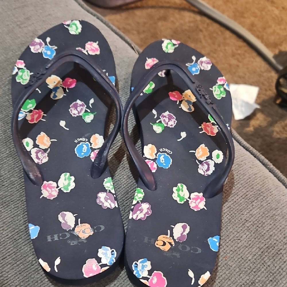 Black with flowers coach size 9. Like new.